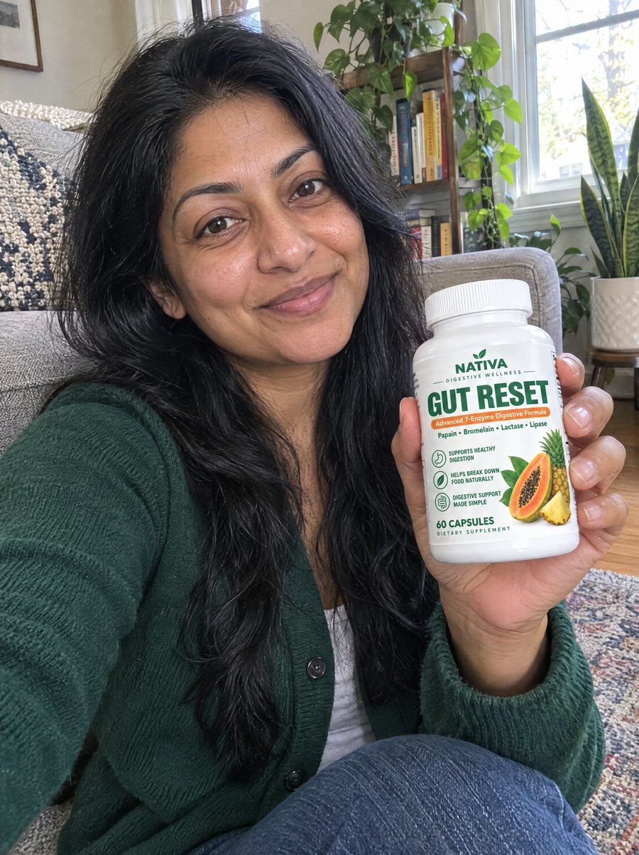 A woman sitting at home holding the Nativa Gut Reset bottle