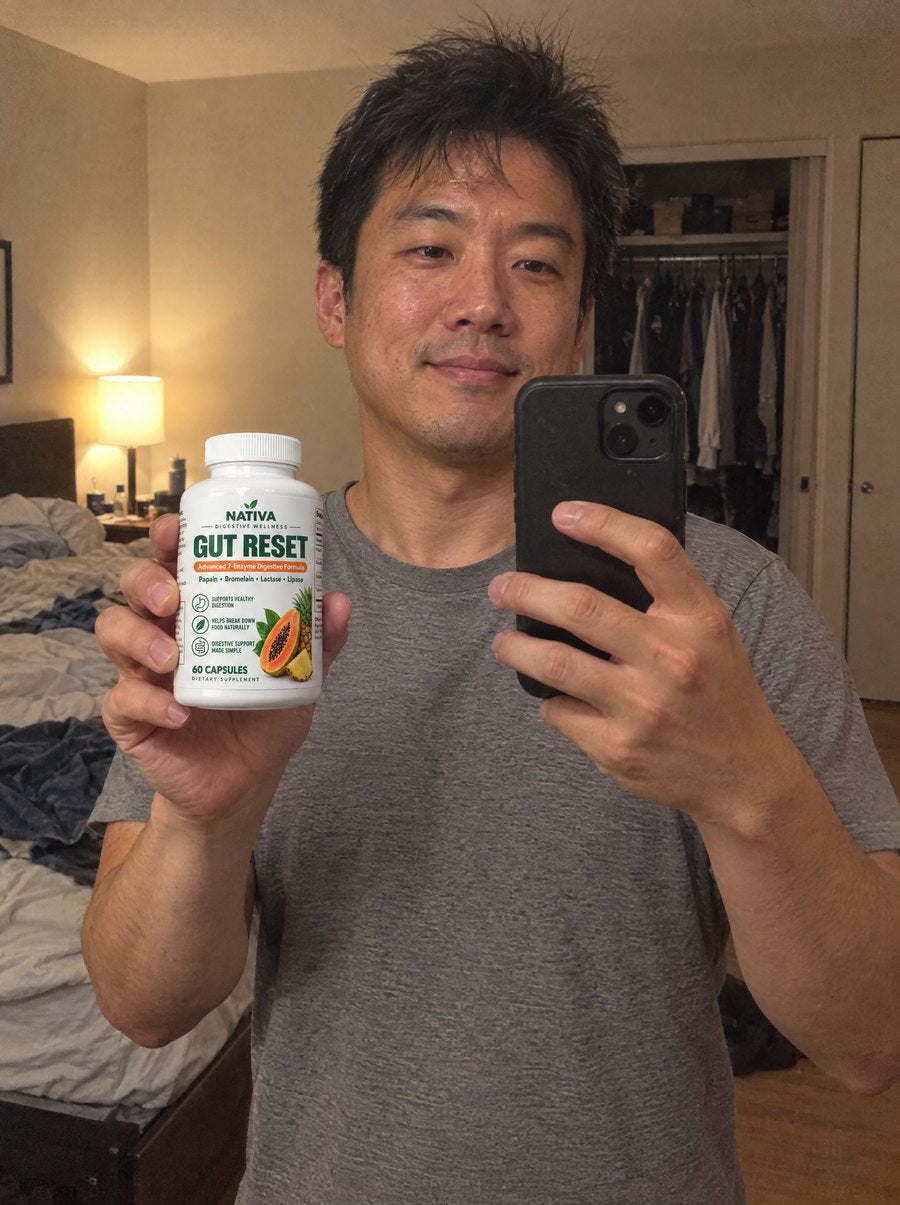 A man taking a mirror selfie with the Nativa Gut Reset bottle